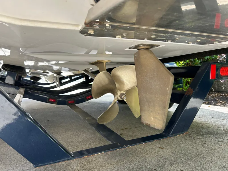 Slide: The Image of 2010 Supra Launch 21 V boat propeller and rudder on trailer. - 8