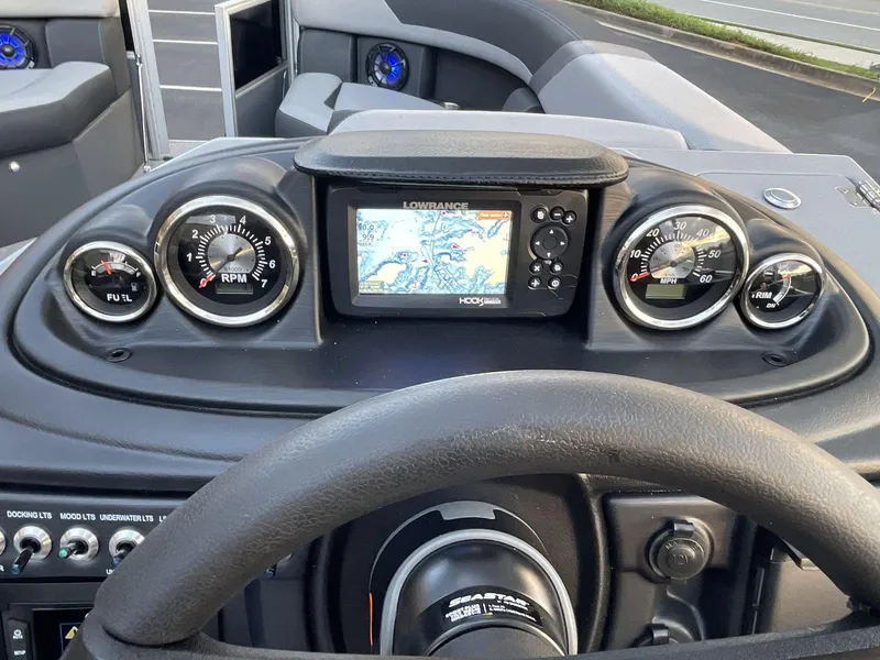 Slide: The Image of Dashboard of 2025 South Bay S224RS boat with navigation system and gauges. - 25