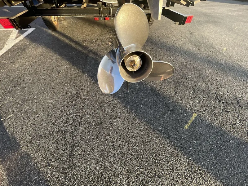 Slide: The Image of Propeller of 2025 South Bay S224RS boat on asphalt surface. - 7