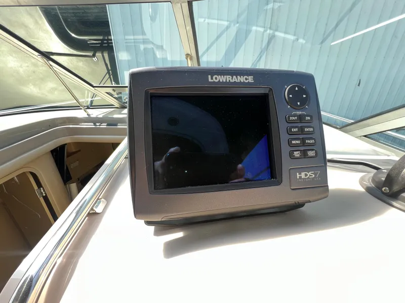 Slide: The Image of Lowrance HDS7 marine GPS on 1998 Sea Ray 290 Sundancer boat dashboard. - 12