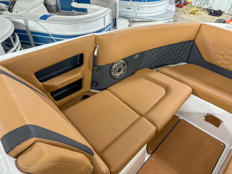 Slide: The Image of Luxurious seating in 2026 Four Winns H9 boat with tan upholstery and modern design. - 6