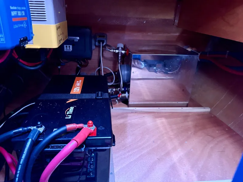 Slide: The Image of Electrical system setup in a 2011 Lagoon 380 S2 catamaran, featuring battery and wiring. - 44