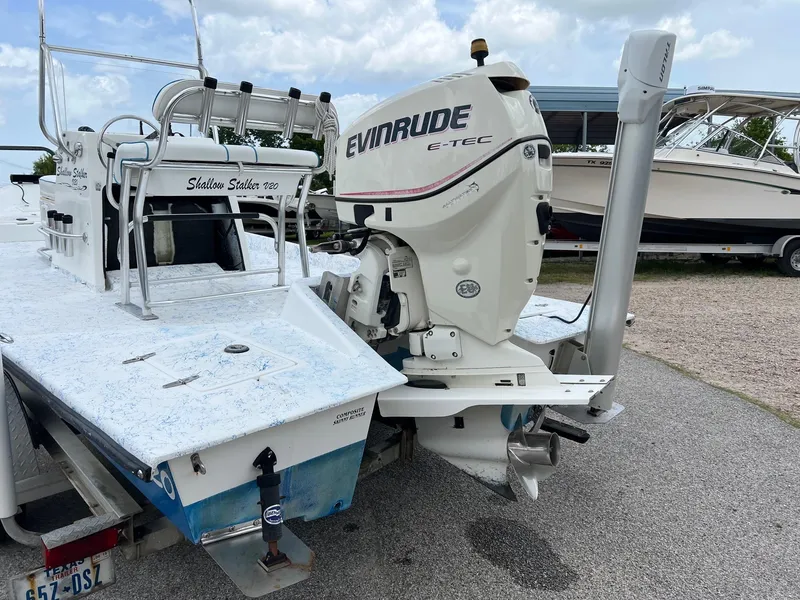 Slide: The Image of 2007 Shallow Stalker V20 boat with Evinrude E-TEC engine on trailer. - 3