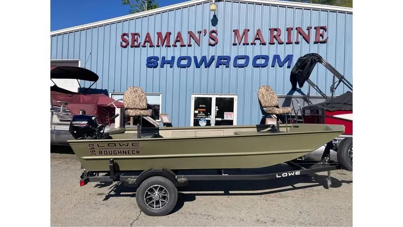 Slide: The Image of 2025 Lowe Roughneck RX1660 Tiller boat displayed at Seaman's Marine Showroom. - 8