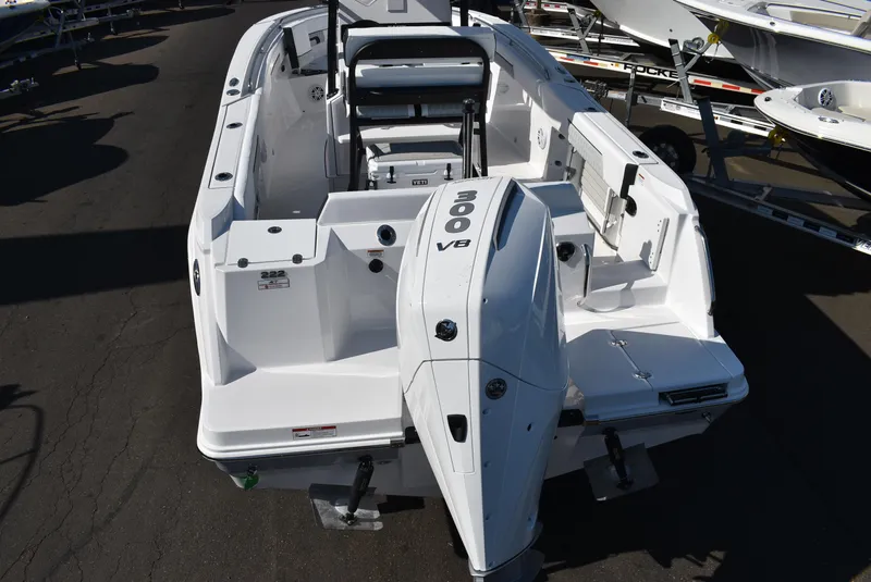 Slide: The Image of 2025 Blackfin 222CC boat with powerful 300 VB engine, docked on a trailer. - 6