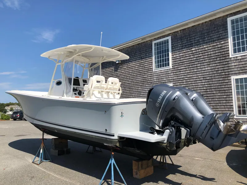 Slide: The Image of 2018 Regulator 28 Center Console boat with Optimus 360 Joystick Control on stands. - 20