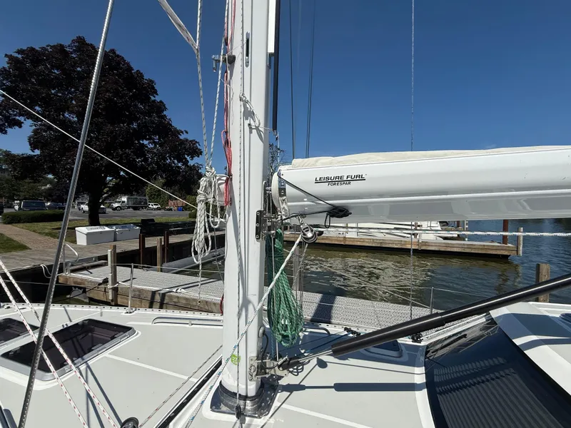 Slide: The Image of 2024 Tartan 455 sailboat mast and rigging at a marina dock. - 10