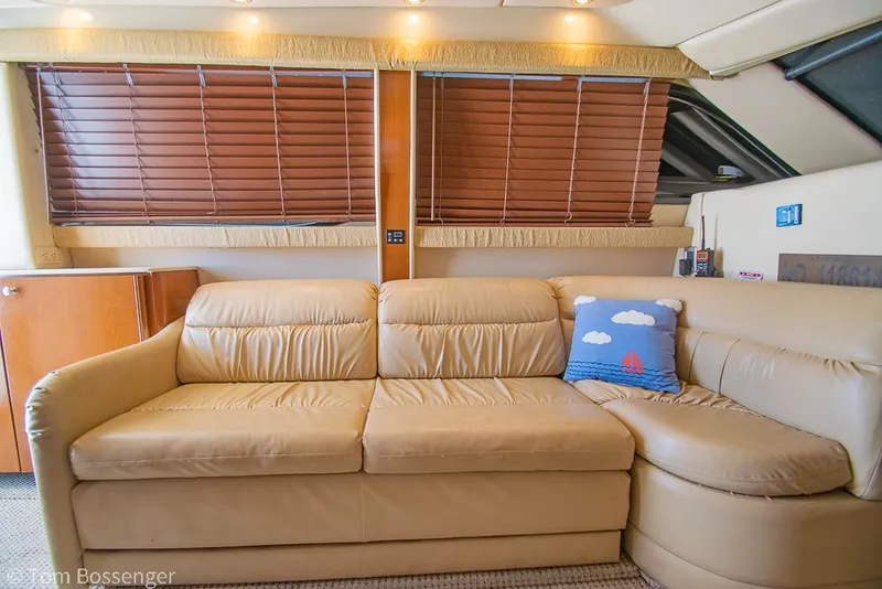 Slide: The Image of Luxurious beige leather sofa in 2005 Meridian 341 Sedan yacht interior. - 20