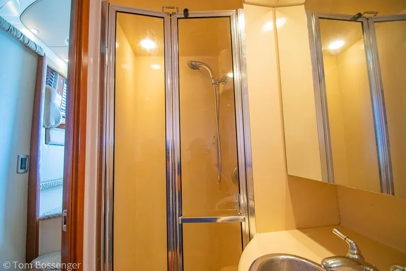 Slide: The Image of Bathroom interior of 2005 Meridian 341 Sedan yacht with shower and sink. - 32