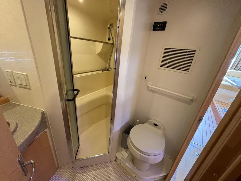 Slide: The Image of Bathroom interior of 2001 Carver 350 Mariner yacht with shower and toilet. - 30