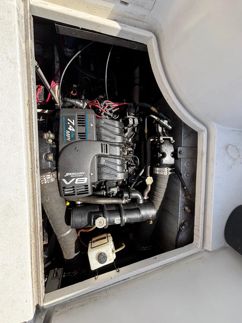 Slide: The Image of Engine compartment of a 2001 Carver 350 Mariner with a Mercury V8 7.4 MPI engine. - 32