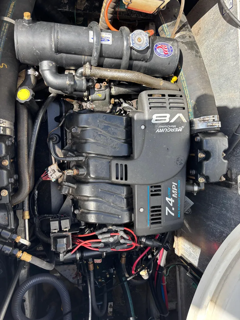 Slide: The Image of Engine compartment of a 2001 Carver 350 Mariner with Mercury 7.4L V8 engine. - 33