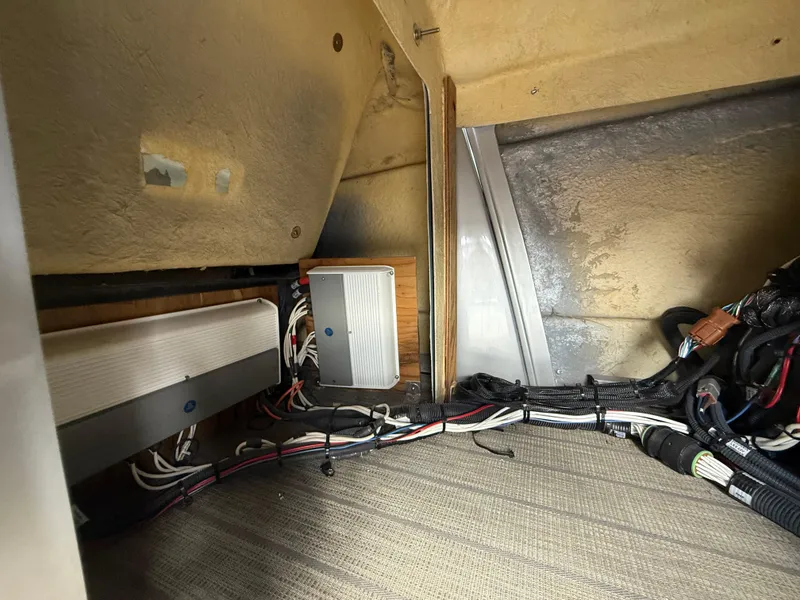 Slide: The Image of Interior wiring and components of a 2021 Manitou 25 XT SRS boat. - 20