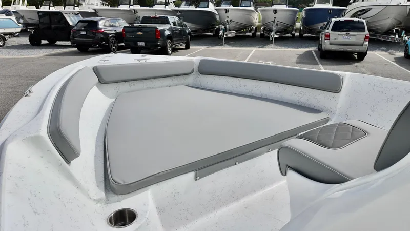 Slide: The Image of 2026 ALK2 Powerboats 18 CRS with spacious seating in a parking lot. - 11