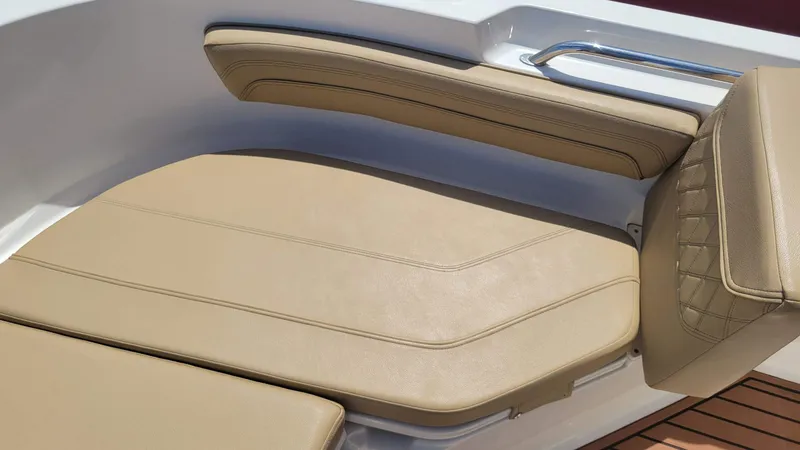 Slide: The Image of 2024 Trophy t20cc boat seating with beige cushions and sleek design. - 38