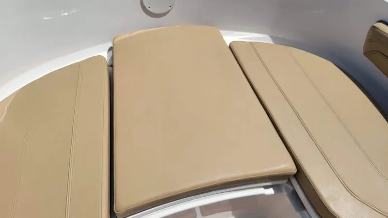 Slide: The Image of 2024 Trophy T20CC boat with beige cushioned seating area. - 40