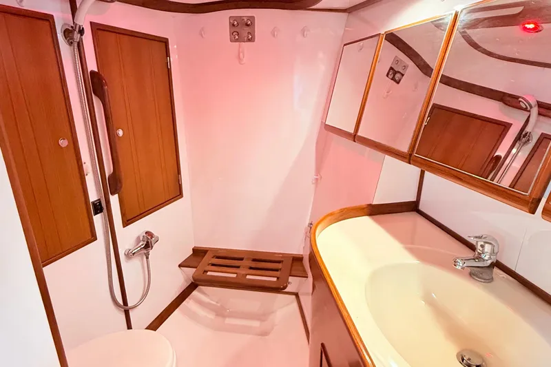 Slide: The Image of Bathroom interior of 2008 Hylas 46 yacht with wooden accents and modern fixtures. - 35