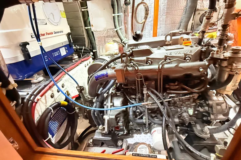 Slide: The Image of Engine room of a 2008 Hylas 46 yacht with generator and wiring. - 39