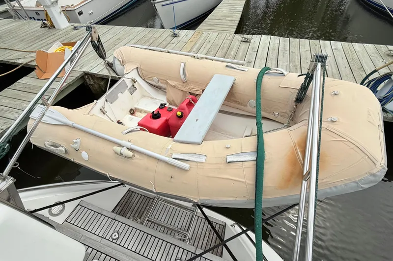 Slide: The Image of Inflatable dinghy on a 2008 Hylas 46 yacht, docked at a marina. - 41