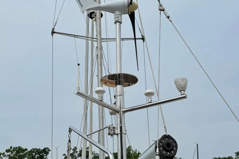 Slide: The Image of Mast and rigging of a 2008 Hylas 46 sailboat with antennas and equipment. - 43
