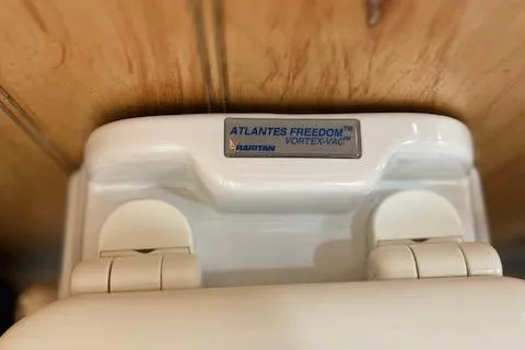 Slide: The Image of Atlantis Freedom Vortex-Vac toilet on 2001 Horizon 16 x 70 Houseboat. - 23