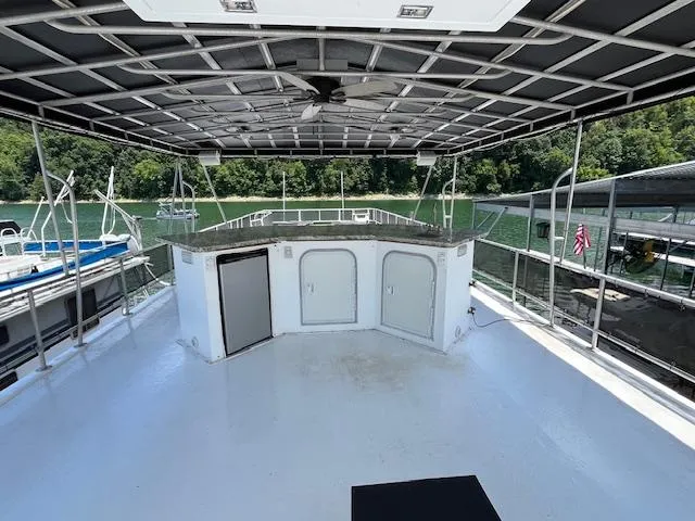Slide: The Image of Upper deck of 2001 Horizon 16 x 70 houseboat with bar and canopy. - 37
