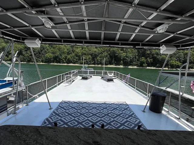Slide: The Image of Spacious deck of 2001 Horizon 16 x 70 houseboat with scenic lake view. - 38