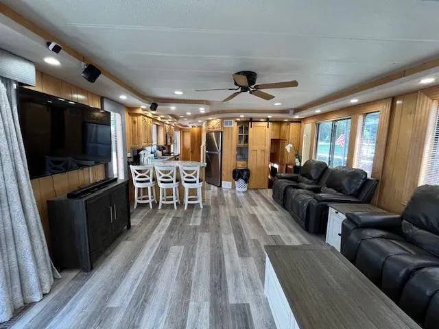 Slide: The Image of Spacious 2001 Horizon 16 x 70 houseboat interior with modern furnishings and large windows. - 6