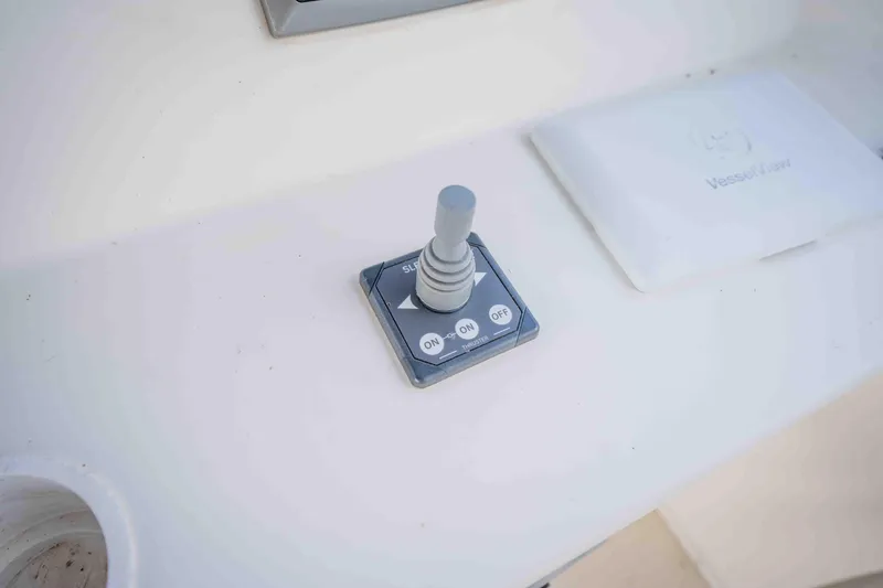 Slide: The Image of Joystick control panel on 2008 Monticello houseboat, featuring on/off buttons. - 22