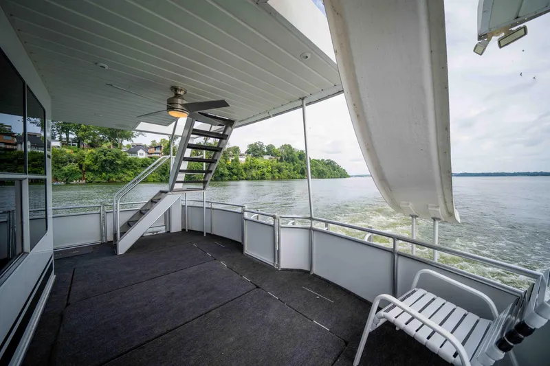 Slide: The Image of 2008 Monticello Houseboat deck with stairs, slide, and scenic river view. - 35