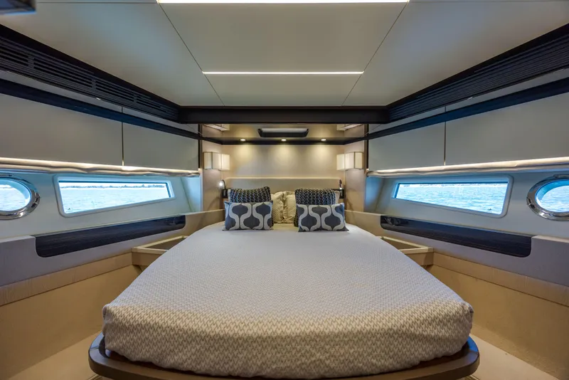 Slide: The Image of Luxurious bedroom interior of 2019 Azimut 66 FLY yacht with modern design and ocean view. - 17
