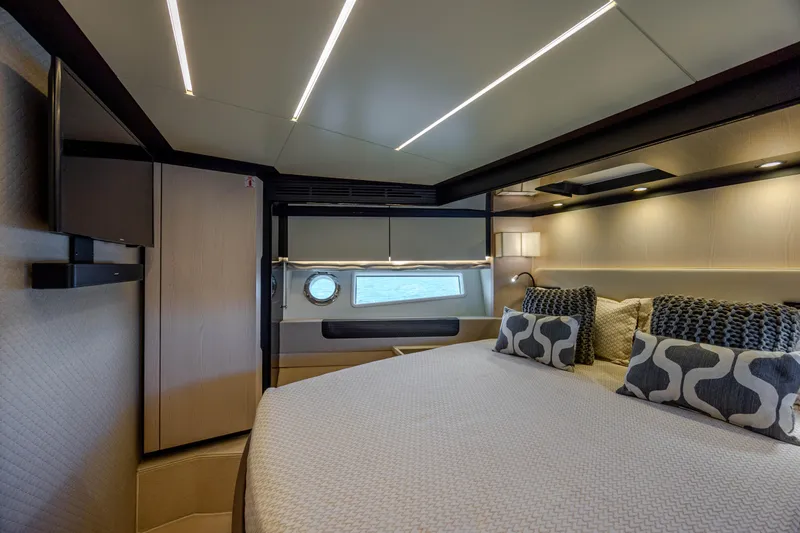 Slide: The Image of Luxurious bedroom interior of 2019 Azimut 66 FLY yacht with modern design and elegant lighting. - 18