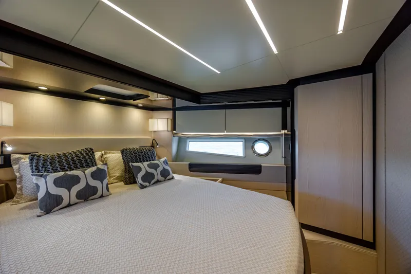 Slide: The Image of Luxurious bedroom interior of 2019 Azimut 66 FLY yacht with modern design and elegant lighting. - 19