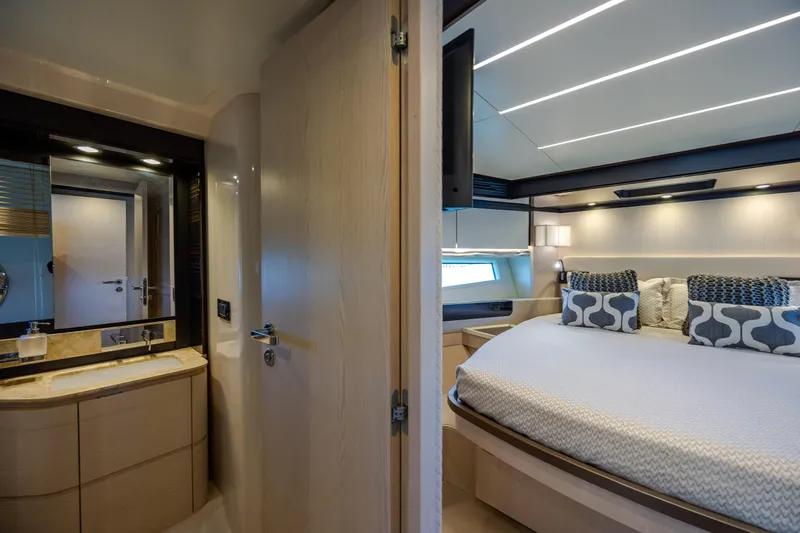 Slide: The Image of Luxurious bedroom and bathroom interior of 2019 Azimut 66 FLY yacht. - 26