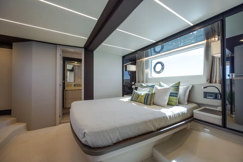 Slide: The Image of Luxurious bedroom interior of 2019 Azimut 66 FLY yacht with modern design and elegant decor. - 33
