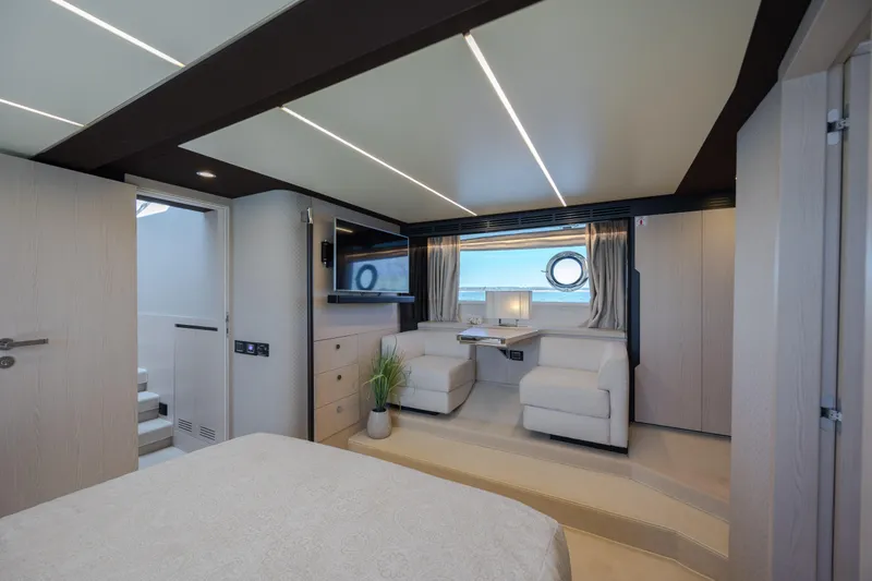 Slide: The Image of Luxurious interior of 2019 Azimut 66 FLY yacht with modern seating and elegant decor. - 36