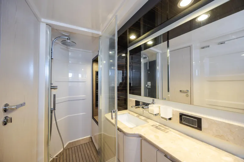 Slide: The Image of Luxurious bathroom in 2019 Azimut 66 FLY yacht with modern shower and elegant fixtures. - 39