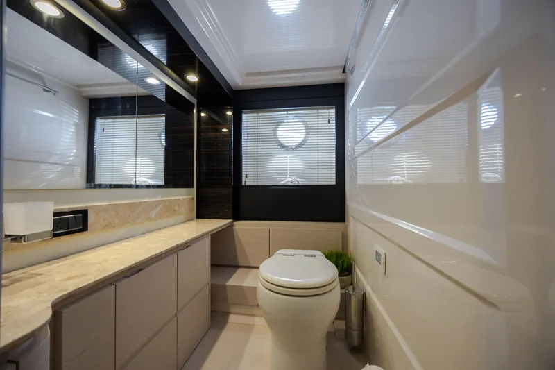 Slide: The Image of Luxurious bathroom interior of 2019 Azimut 66 FLY yacht with modern fixtures and elegant design. - 40