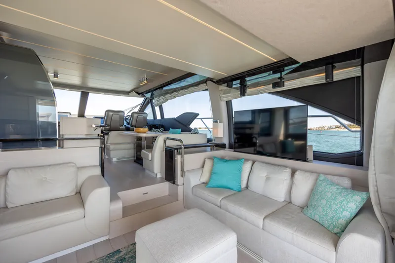 Slide: The Image of Luxurious interior of 2019 Azimut 66 FLY yacht with modern seating and ocean view. - 42
