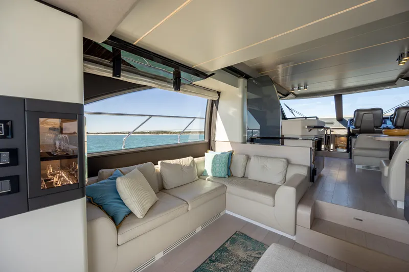 Slide: The Image of Luxurious interior of 2019 Azimut 66 FLY yacht with elegant seating and panoramic views. - 43