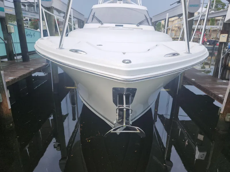 Slide: The Image of 2015 Jupiter 41 SB boat docked in marina, front view. - 11