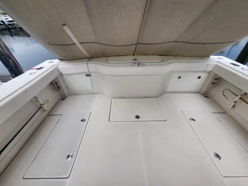 Slide: The Image of 2015 Jupiter 41 SB boat deck with storage compartments and canopy. - 17