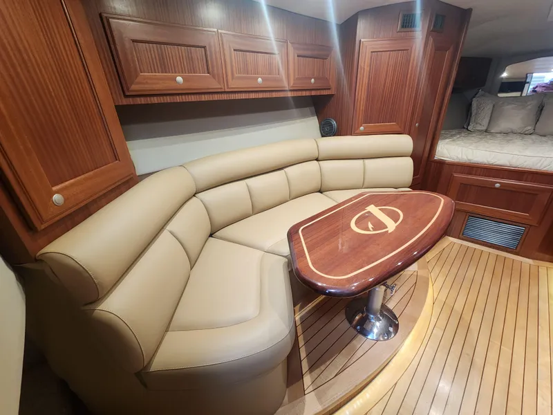 Slide: The Image of Luxurious interior of 2015 Jupiter 41 SB yacht with leather seating and wooden accents. - 29