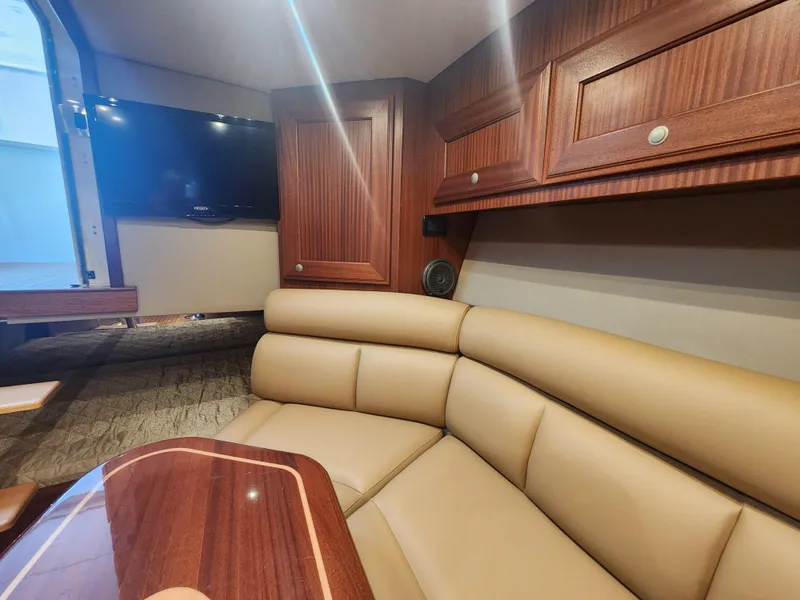 Slide: The Image of Luxurious interior of 2015 Jupiter 41 SB yacht with leather seating and wood finishes. - 46