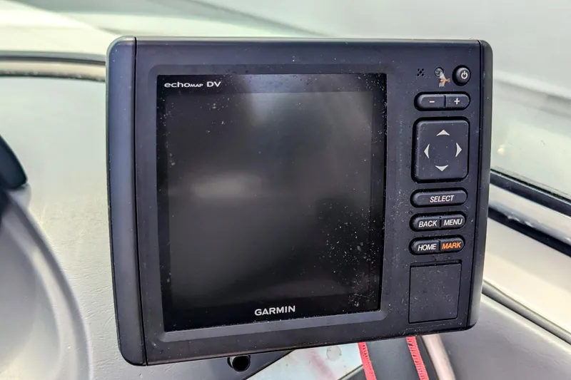Slide: The Image of Garmin EchoMap DV on 2011 Sea Ray 260 Sundeck dashboard, featuring navigation controls. - 15