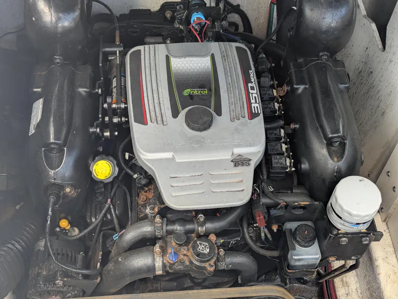 Slide: The Image of Engine of a 2011 Sea Ray 260 Sundeck boat, featuring a MerCruiser 350 MAG. - 16