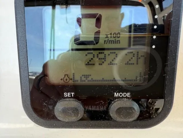 Slide: The Image of Close-up of a Wellcraft 290 Coastal 2015 boat's digital display showing engine hours and RPM. - 24
