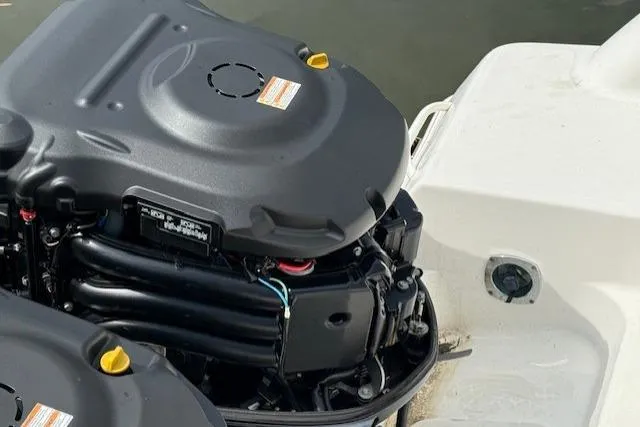 Slide: The Image of 2015 Wellcraft 290 Coastal boat engine close-up, showcasing mechanical details and design. - 29