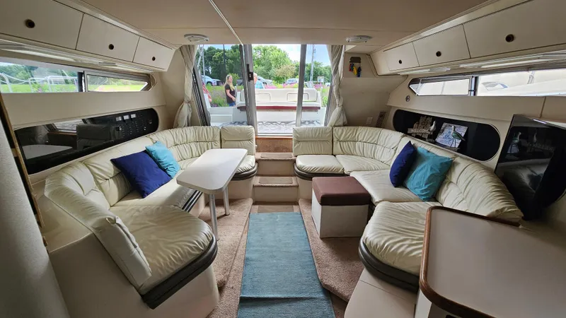 Slide: The Image of Interior of 1989 Carver 38 Santego yacht with plush seating and modern decor. - 16
