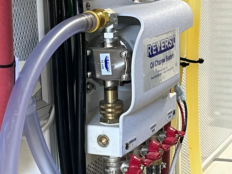 Slide: The Image of Reverso oil change system on 2025 Helmsman Trawlers 43E PILOTHOUSE. - 48